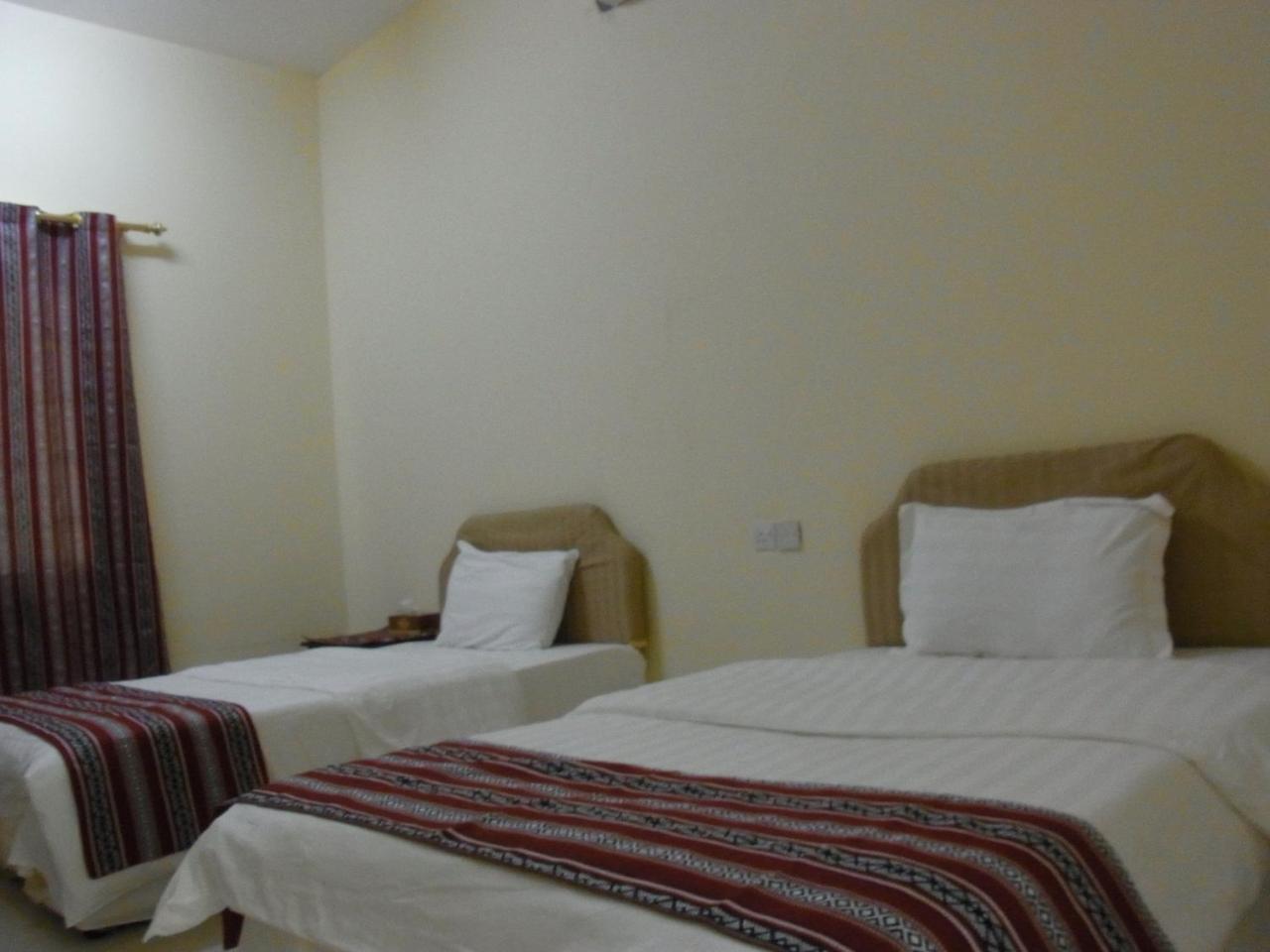 Al Ghazlan Hotel Sinaw Ruddah Extérieur photo